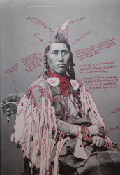 Black and white photograph of Déaxitchish / Pretty Eagle in 1880, annotated by contemporary artist Wendy Red Star in red market. Annotations are transcribed in resource information